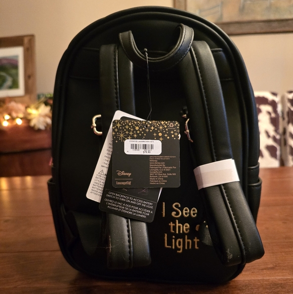 LOUNGEFLY DISNEY TANGLED RAPUNZEL LANTERNS LIGHT UP TOWER MINI BACKPACK NWT - Picture 2 of 2